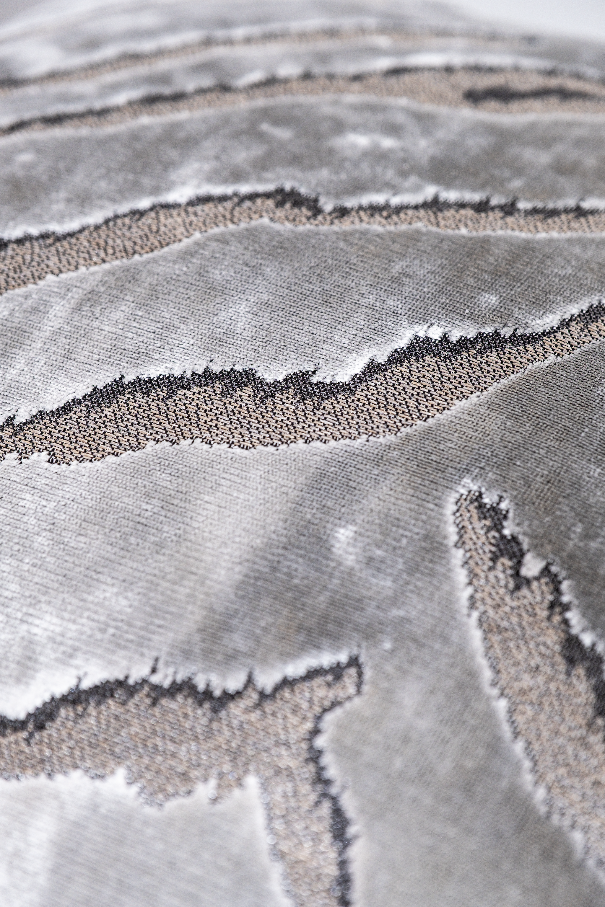 Close up of a silver tiger stripe velvet