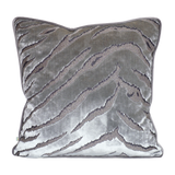 Decorative cushion in a shiny silver velvet with a tiger stripe pattern