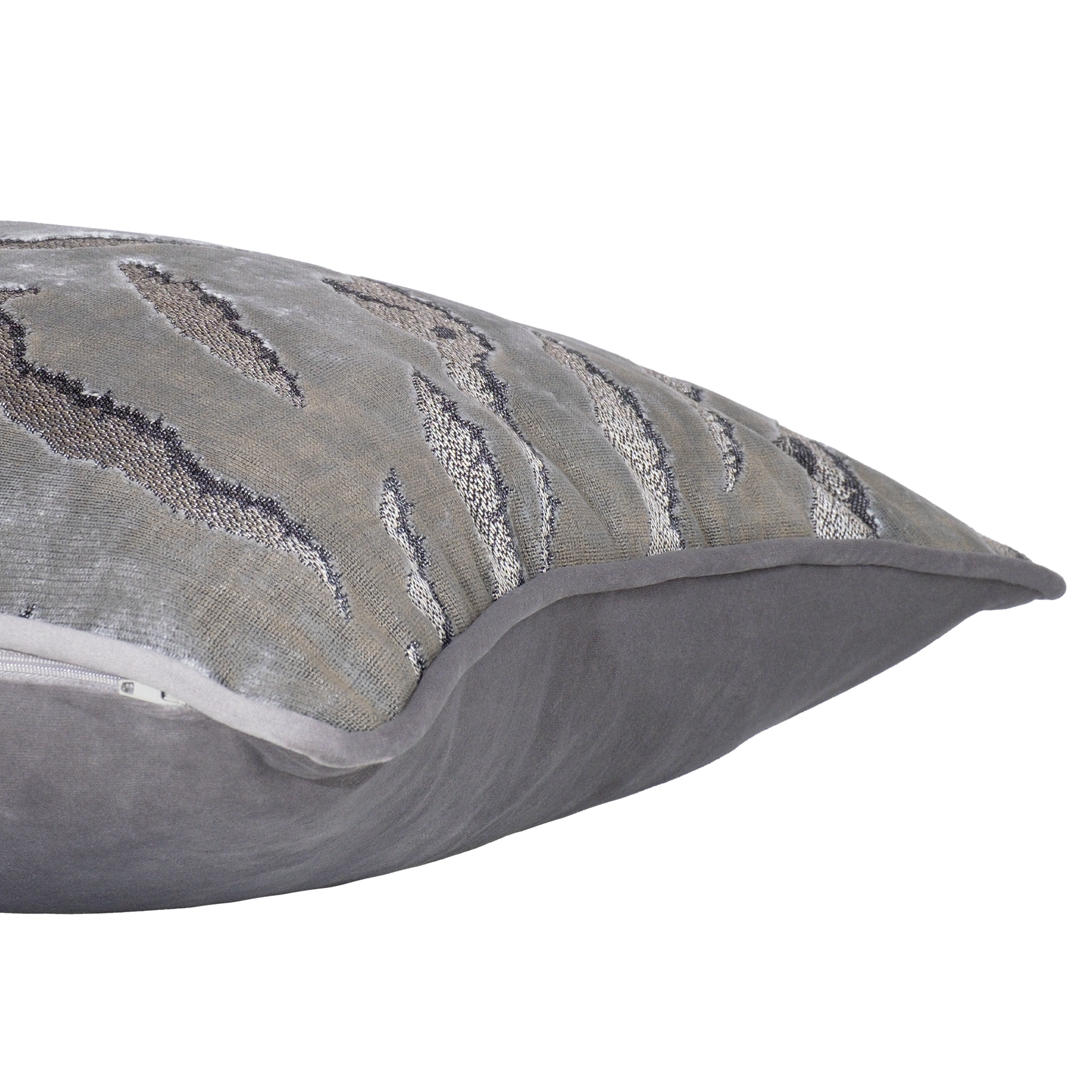Side shot of a decorative cushion in a shiny silver velvet with a tiger stripe pattern