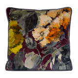 Floral patterned pillow with abstract design on a deep pruple background