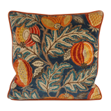 Decorative cushion with floral and fruit pattern on a blue background