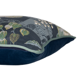 Decorative pillow with floral pattern on a blue background