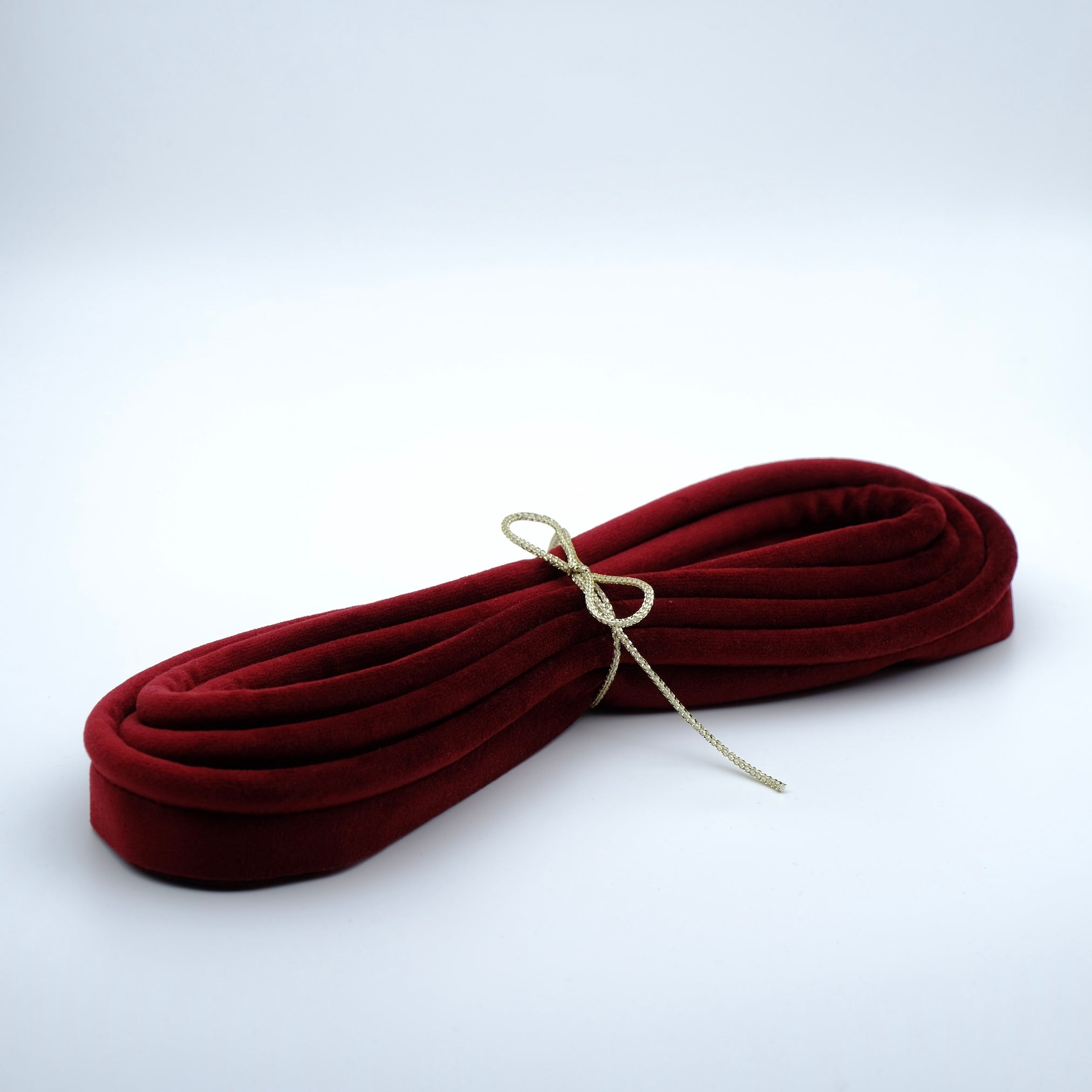 Photo of a bundle of cinnamon velvet piping cord