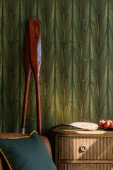 Close-up of green reed wallpaper with a wooden oar and a rustic cabinet decorated with fruits.