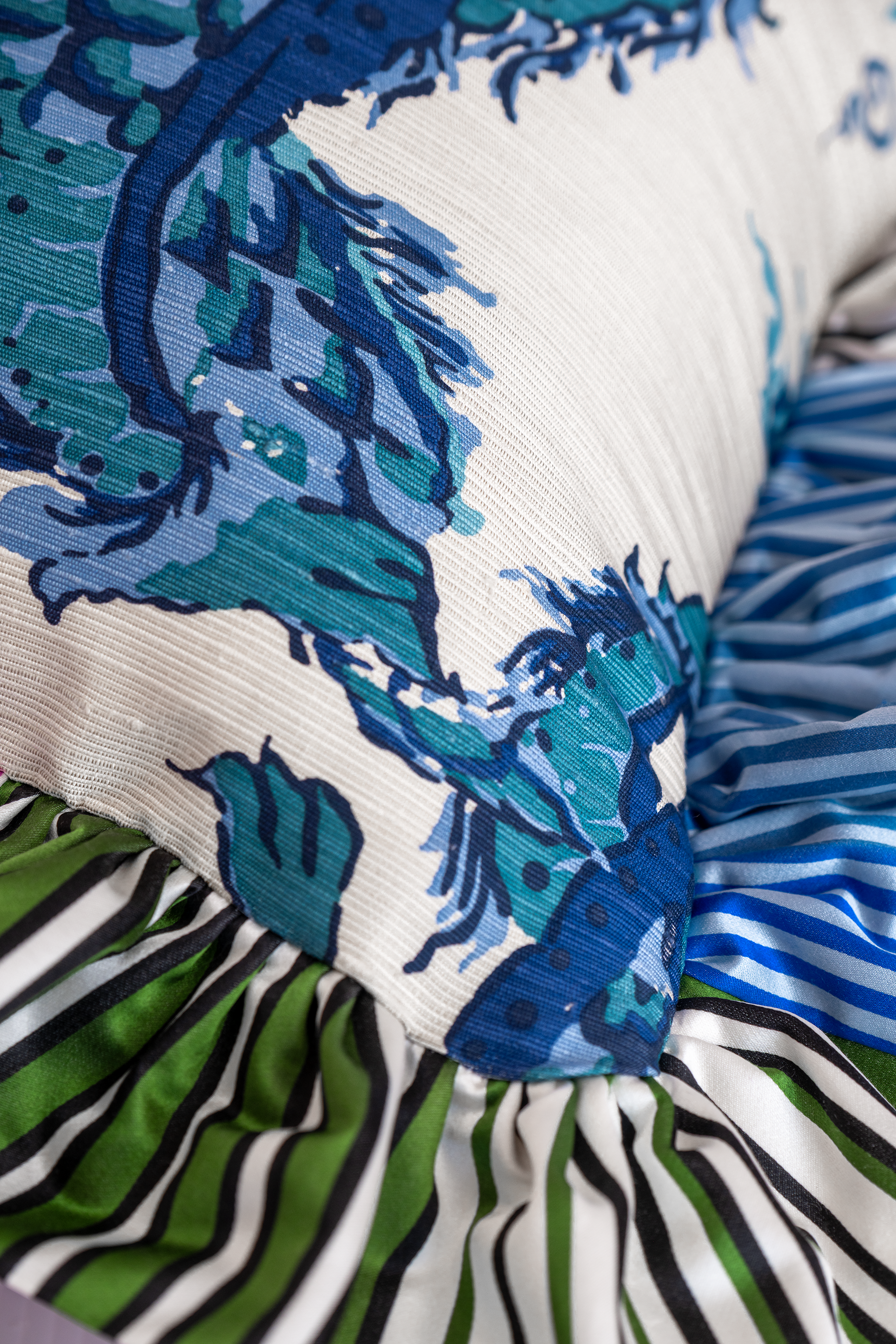 close up of a frilled cushion make from silk
