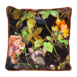 Floral-patterned pillow with colorful flowers on a black background