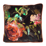 Floral pillow with vibrant colors on a dark background