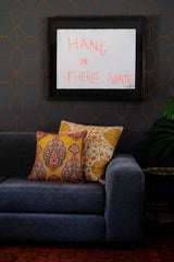 Lounge setting with bright patterned cushions