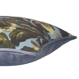 Decorative cushion with floral pattern on a light blue background