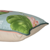 Decorative cushion with floral and leaf pattern on a white background