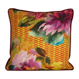 Printed linen cushion in bright colours with a floral and geometric design