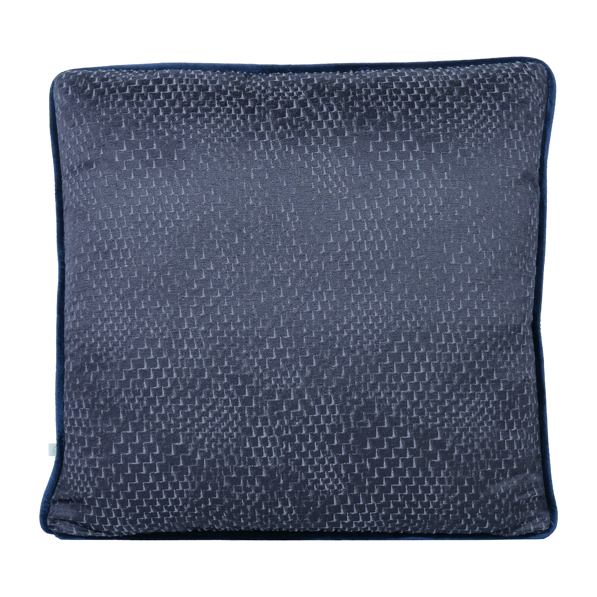 A square throw pillow in dark navy blue velvet with a textured, woven geometric pattern across the front, finished with a solid navy piped edge