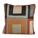 Geometric linen cushion in black, rust, and tan linen