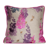 Floral patterned pillow with pink and purple flowers on a beige background