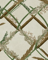 Image of the ornamental reed wallpaper by mind the gap.
The design showcases interwoven green stems forming a lattice pattern over a light cream background. Delicate botanical elements like wheat and fern-like leaves are intricately detailed in muted greens and tans, giving a natural, textured look. The medium resembles a digital or hand-drawn textile illustration.