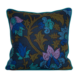 Photo of a cushion made from a 1970s printed damask in bright blue and purple