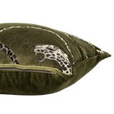 Green pillow with embroidered leopard design on a white background