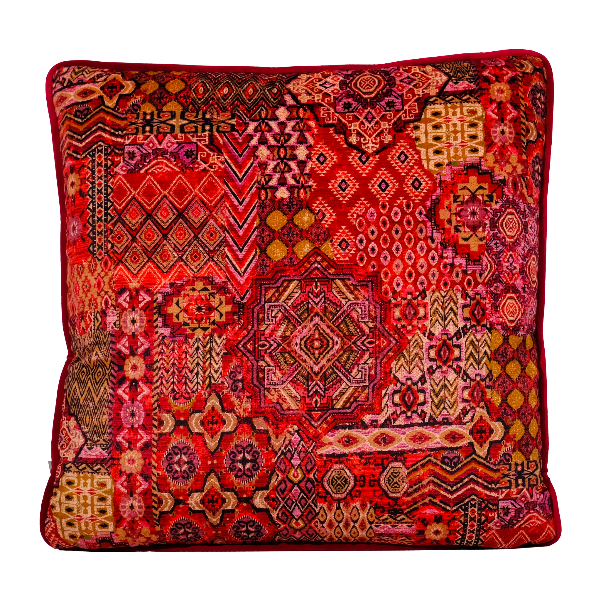 Decorative pillow with a vibrant red pink and orange Persian inspired pattern