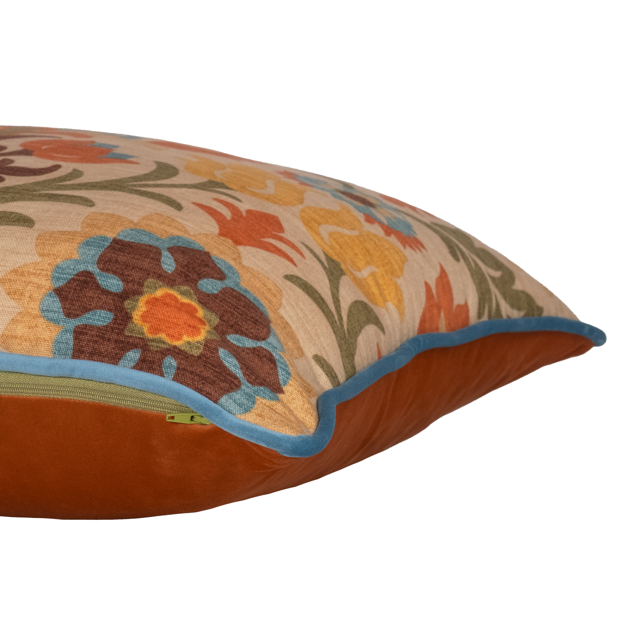 Side shot of a decorative cushion with a spanish inspired damask in autumn colours
