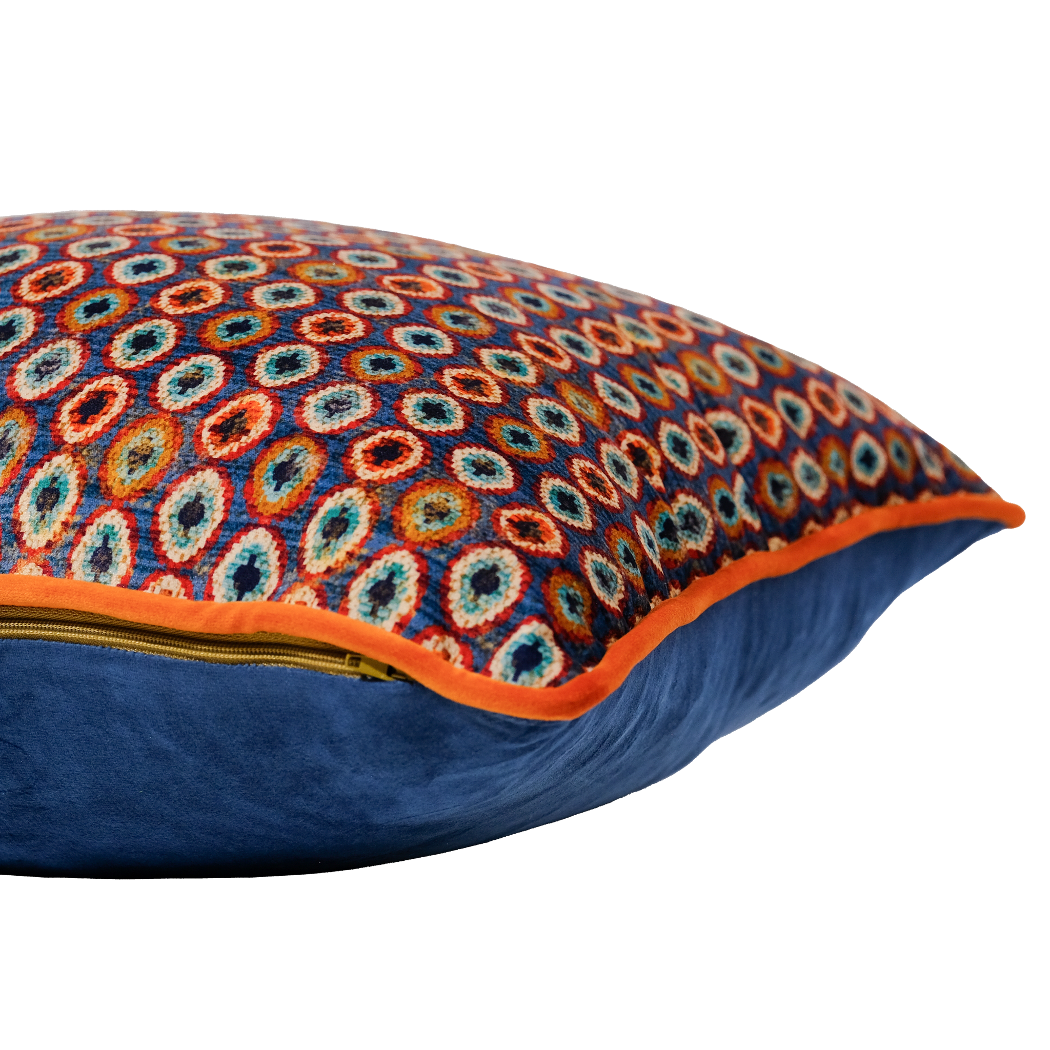 Side shot of a decorative pillow with a geometric pattern of oval medallions in blue and brown