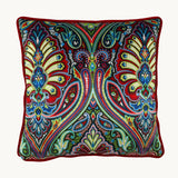 photo of a brightly coloured velvet cushion with a design inspired by motifs from the Ottoman Empire.