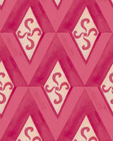 A striking pink wallpaper with geometric diamond patterns and swirling floral motifs, adding a bold, vintage-inspired feel