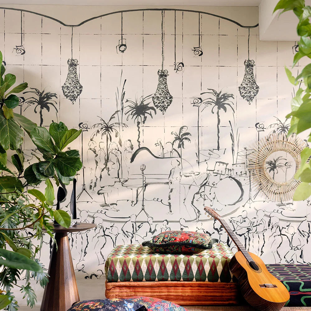 Living space with a large jazz mural wallpaper featuring chandeliers, musicians, and dancing crowd.