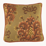 Photo of a square cushion with a khaki background and baroque scrolled motifs in a chestnut colour
