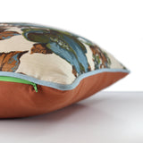 Side view of a cushion made from a vintage fabric with large scale flowers in slate blue with touches of olive and cinnamon