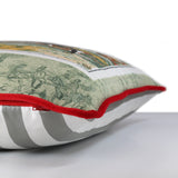 Side view of a vintage barkcloth cushion with a classic english hunting scene of a huntsman on his horse with hounds at his feet, scarlet velvet piping and a crisp grey and white striped back