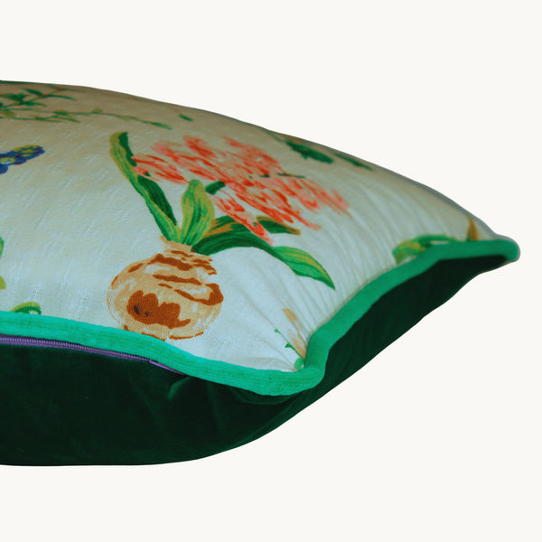 Floral cushion with a white background and old english flowers