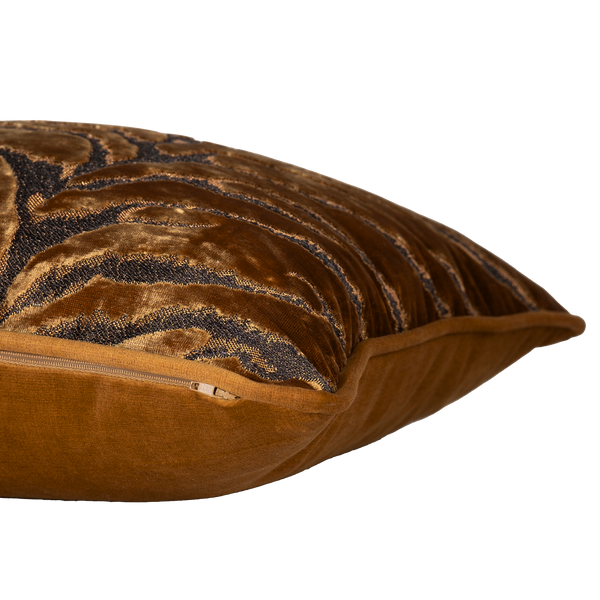 Decorative cushion with a large scale tiger stripe in bronze velvet