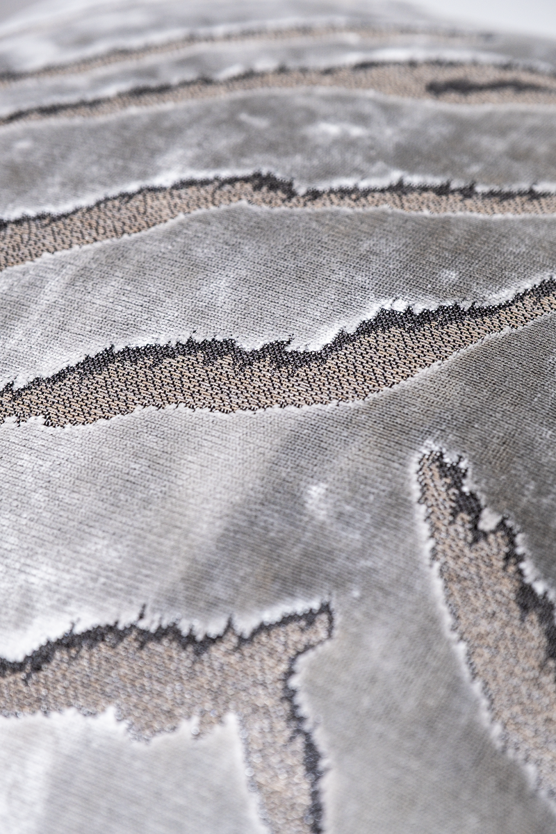 Close up of a silver tiger stripe velvet