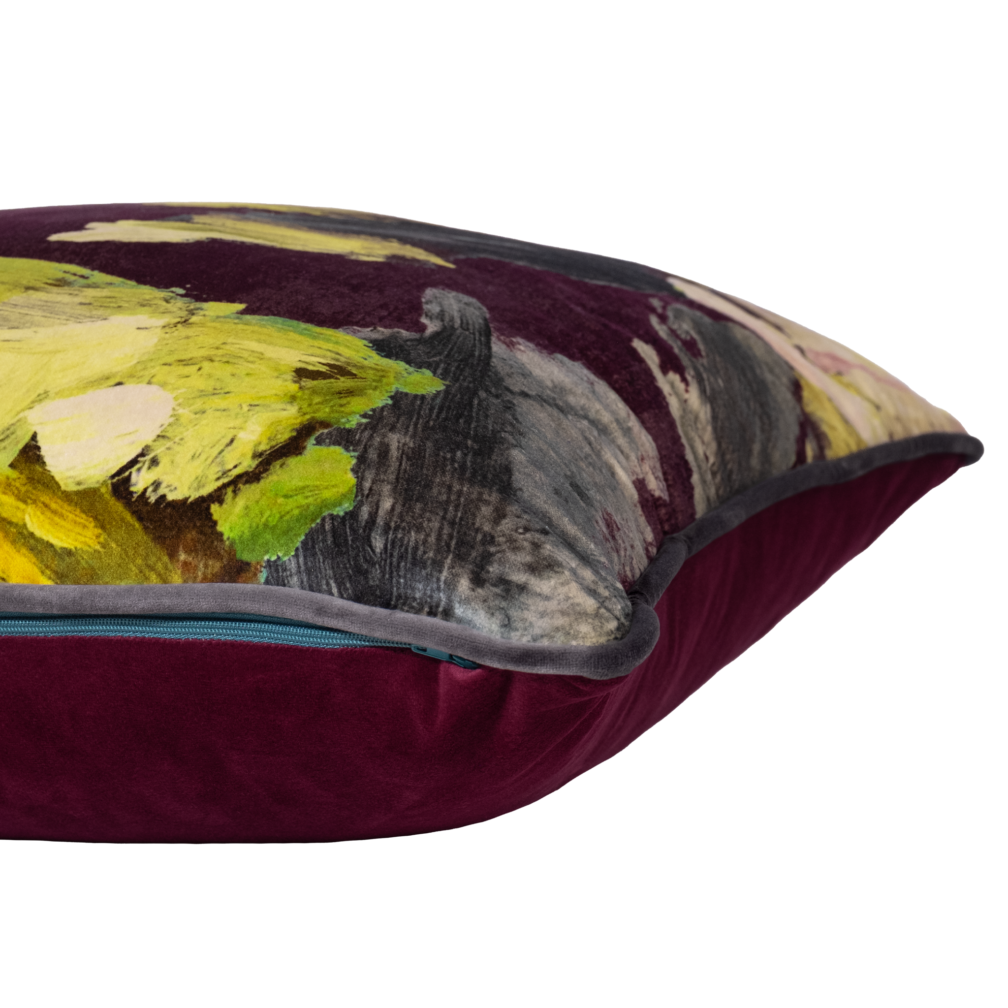 Decorative pillow with abstract art design on a deep purple background