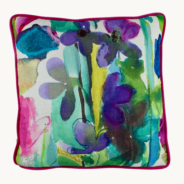 Photo of a brightly coloured floral cushion with painterly brushstrokes