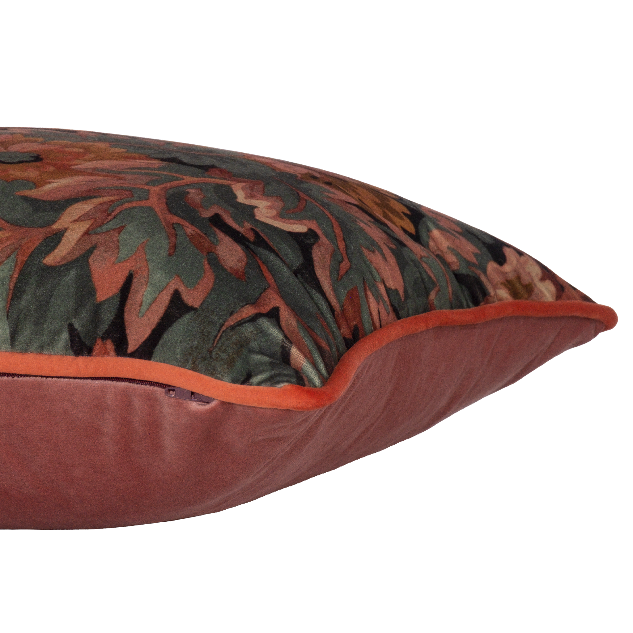 Side photo of a decorative cushion with a tradtional floral pattern on velvet