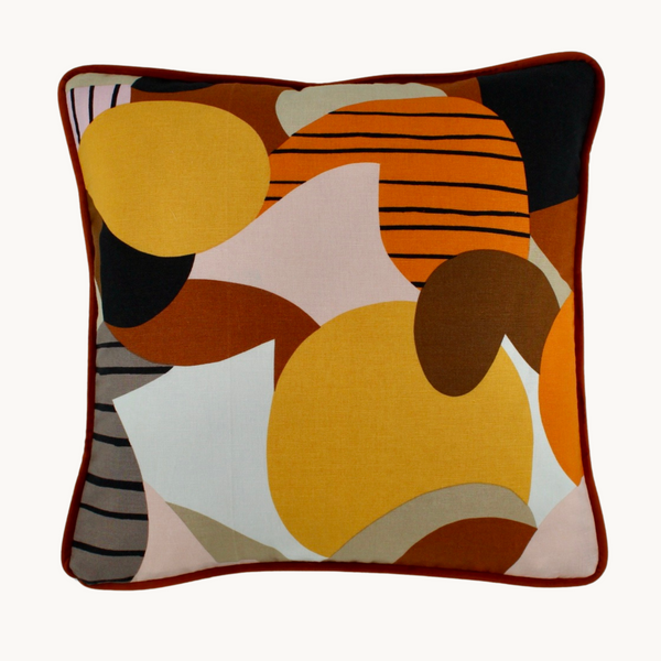 Photo of a cushion in an abstract geometric design by Marimekko