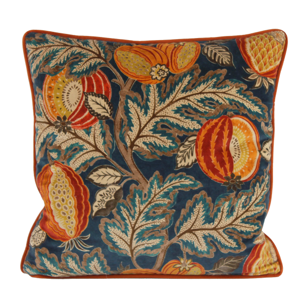 Decorative cushion with floral and fruit pattern on a blue background