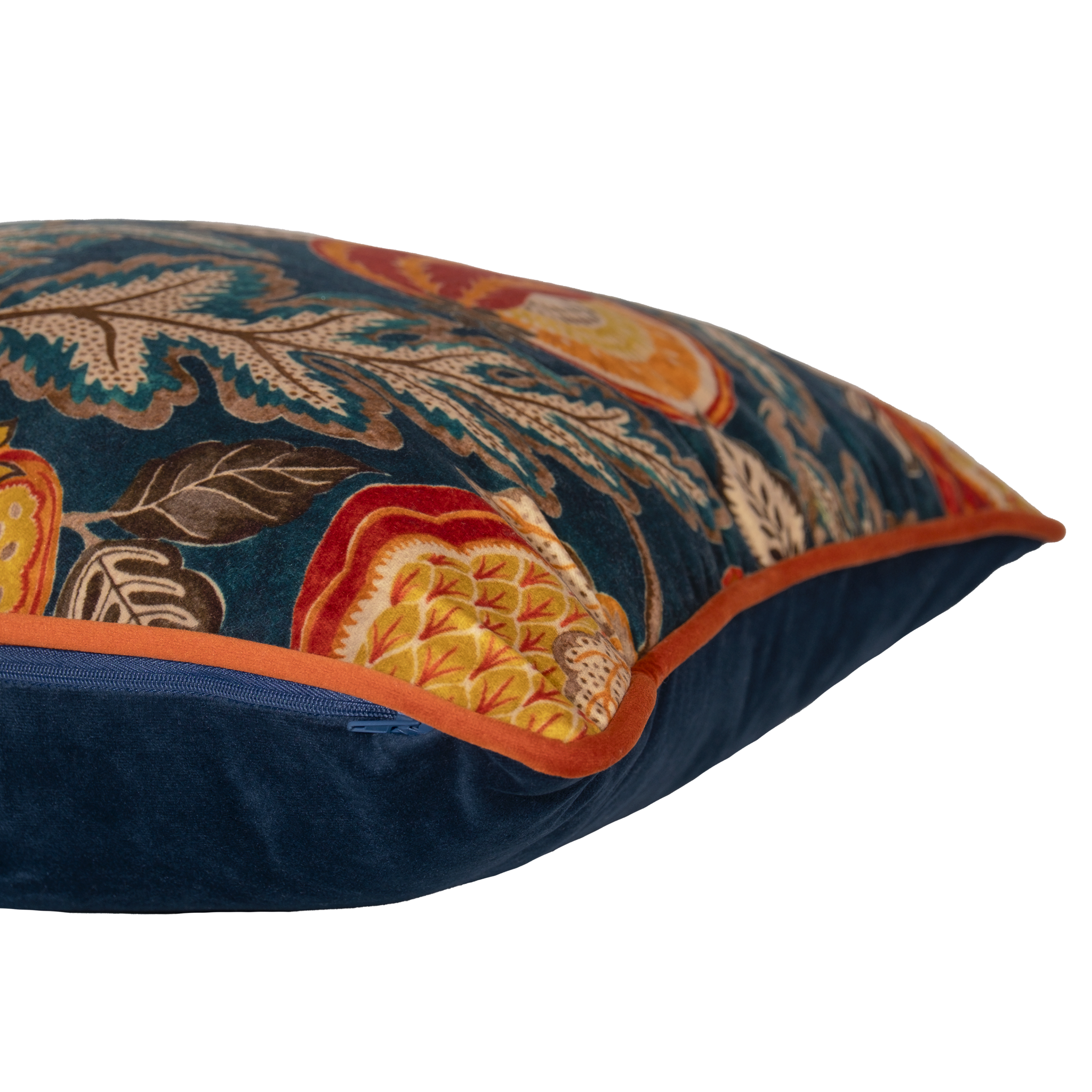 Decorative pillow with floral and fruit pattern on a dark blue background