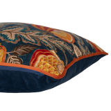 Decorative pillow with floral and fruit pattern on a dark blue background