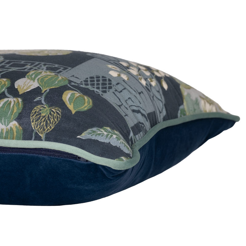 Decorative pillow with floral pattern on a blue background