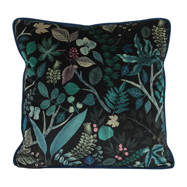 Decorative cushion with a leafy  botanical pattern on a black velvet background