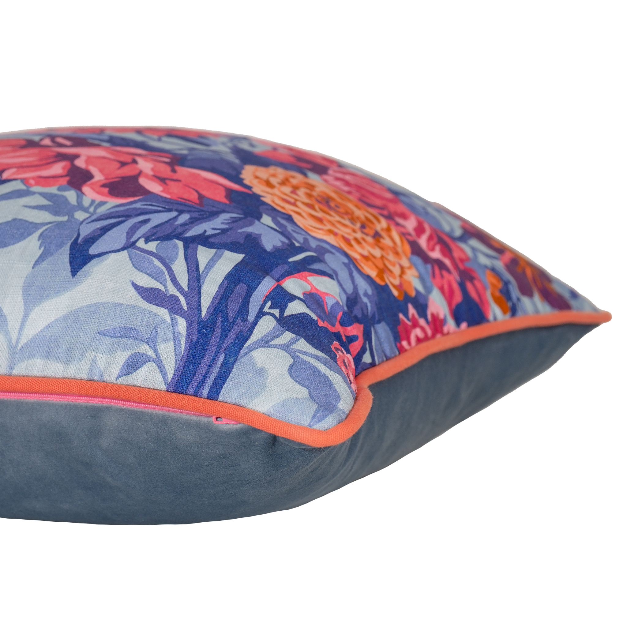 Floral patterned cushion with  pink, coral and orange dahlias on a light blue background