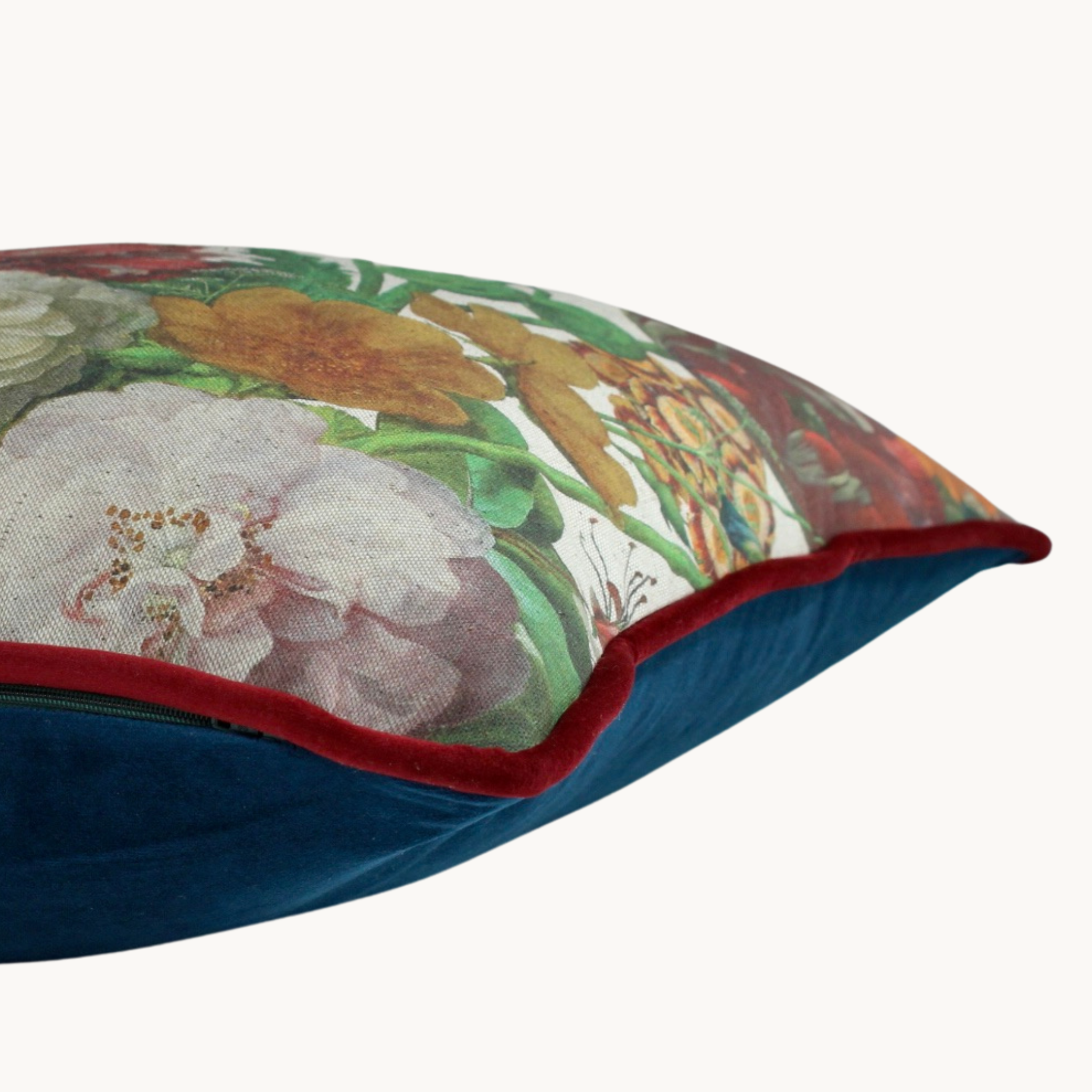 Side shot of a floral cushion in the style of Dutch Masters paintings.
