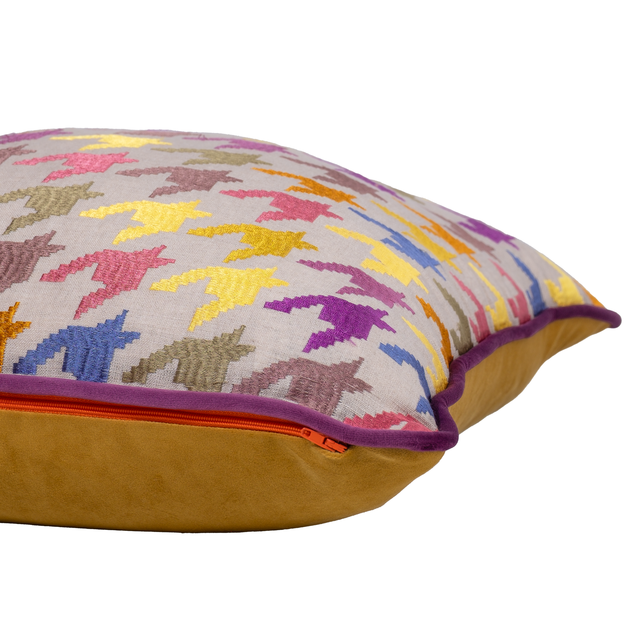 Multicoloured cushion with an embroidered houndstooth pattern in purple gold and orange on a natural linen base
