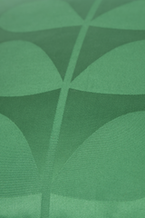 Close up of an emerald green sateen with a linear leaf mid-century pattern