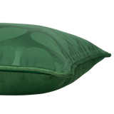 Side shot of an emerald green cushion with a linear leaf mid-century pattern