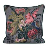 Decorative floral cushion with large boquet of flowers in grey pink red navy and aquamarine.