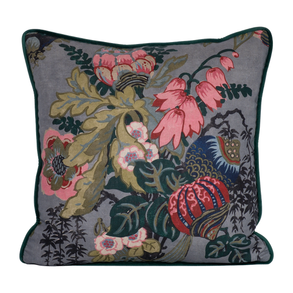 Decorative floral cushion with large boquet of flowers in grey pink red navy and aquamarine.