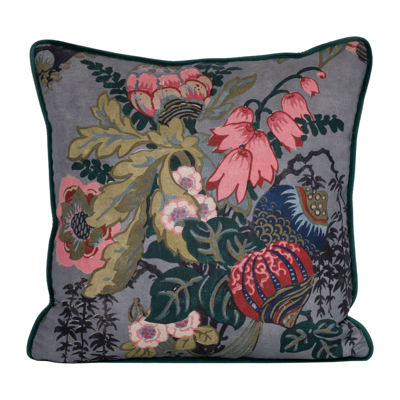 Decorative floral cushion with large boquet of flowers in grey pink red navy and aquamarine.